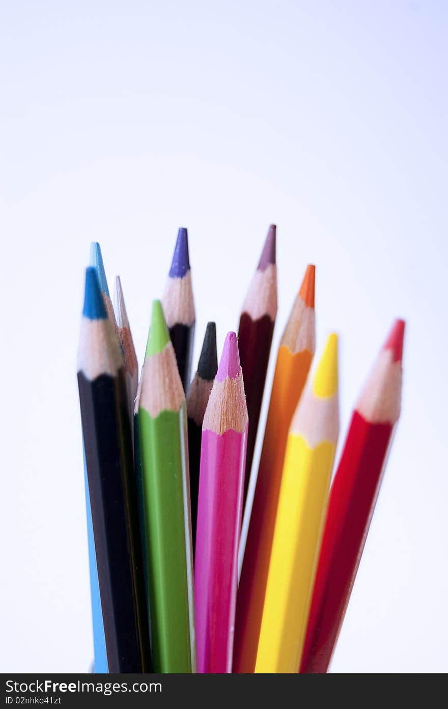 Close up of many colored pencils isolated