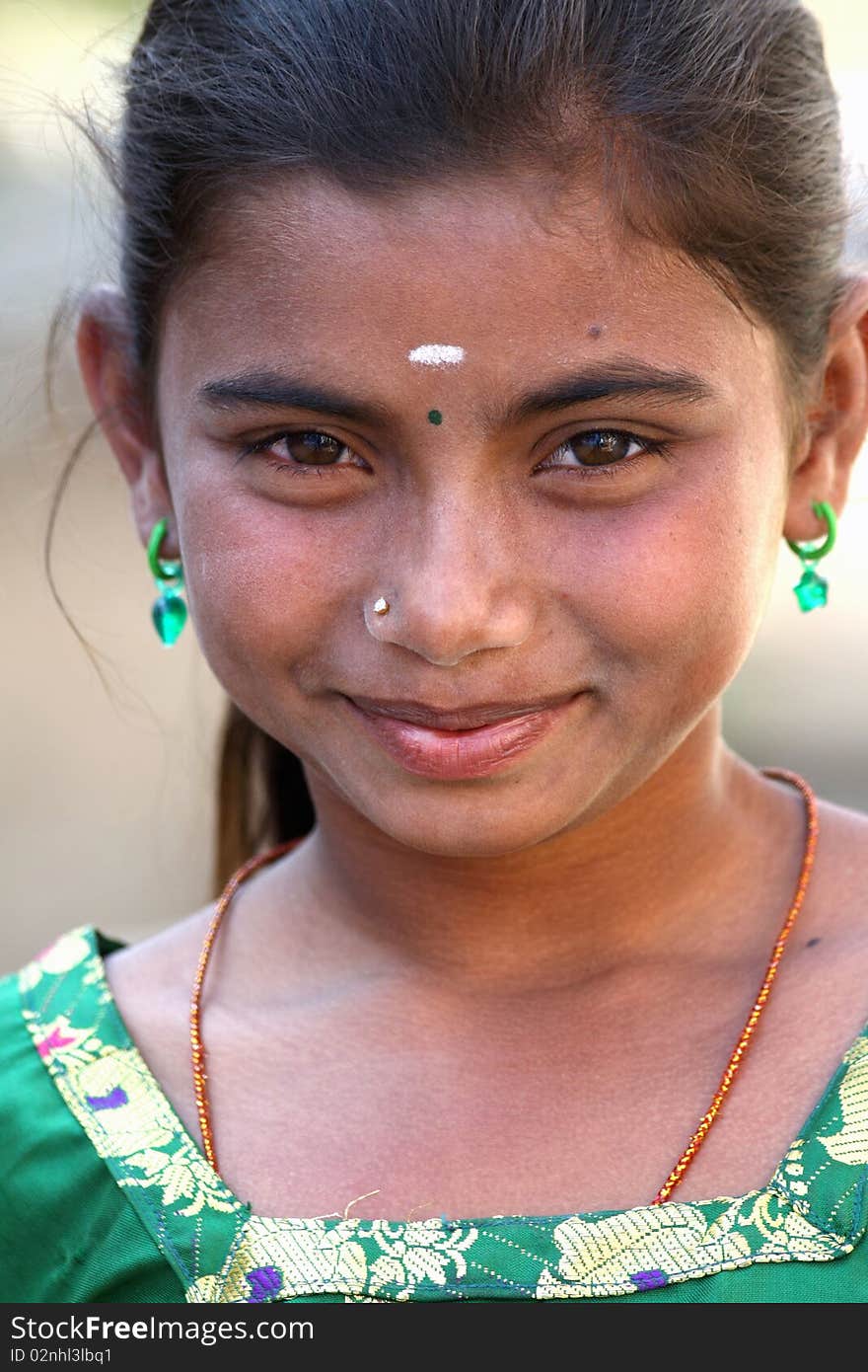 Smiling Indian Teenage Girl Looking at the Camera