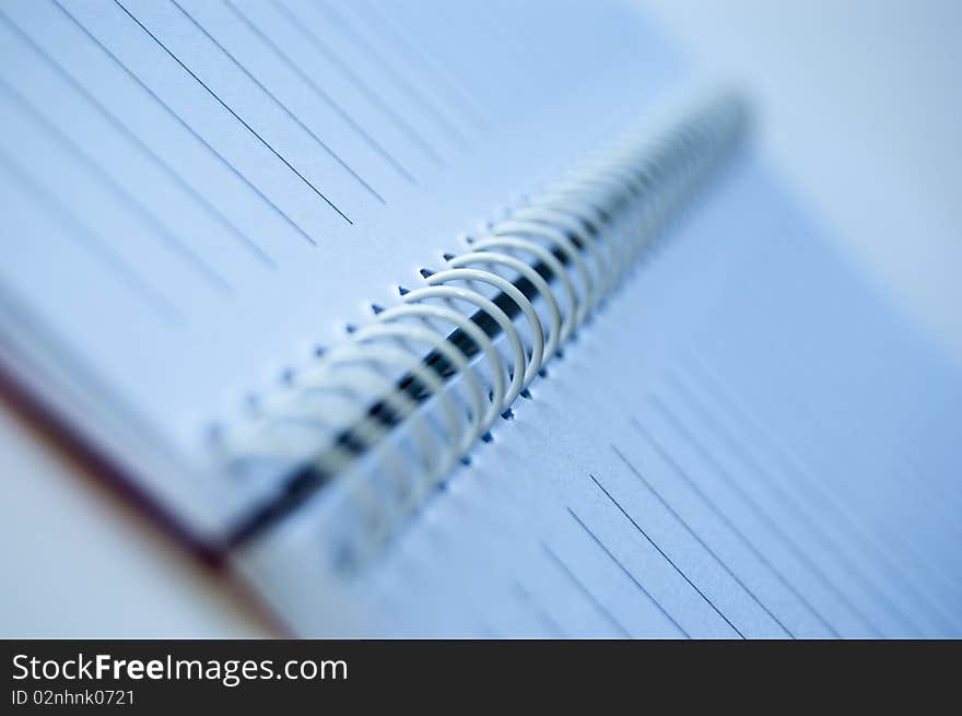 A notebook isolated on a white background. A notebook isolated on a white background