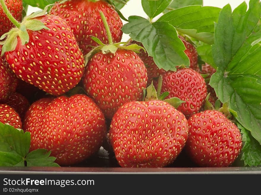 Heap of a lot of fresh red strawberries