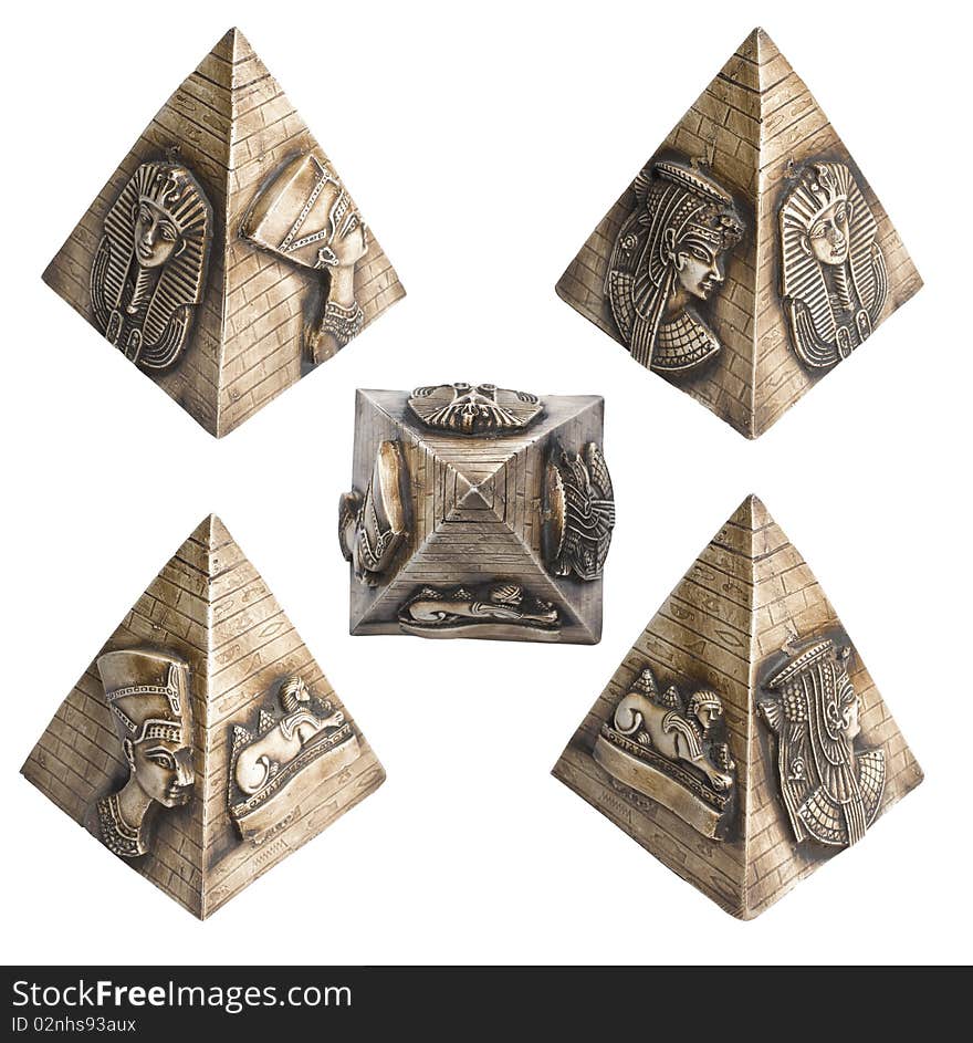 Diffetent views on decorative small egyptian pyramid with historical ornaments. Isolated on white background. Diffetent views on decorative small egyptian pyramid with historical ornaments. Isolated on white background
