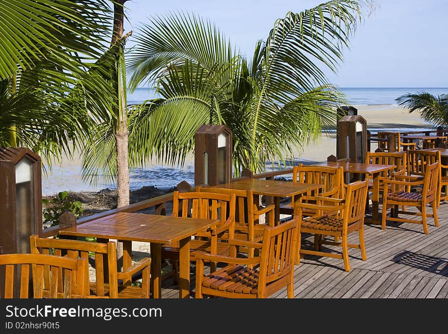 Table and chairs in empty cafe  at island Koh Chang , Thailand. Table and chairs in empty cafe  at island Koh Chang , Thailand.