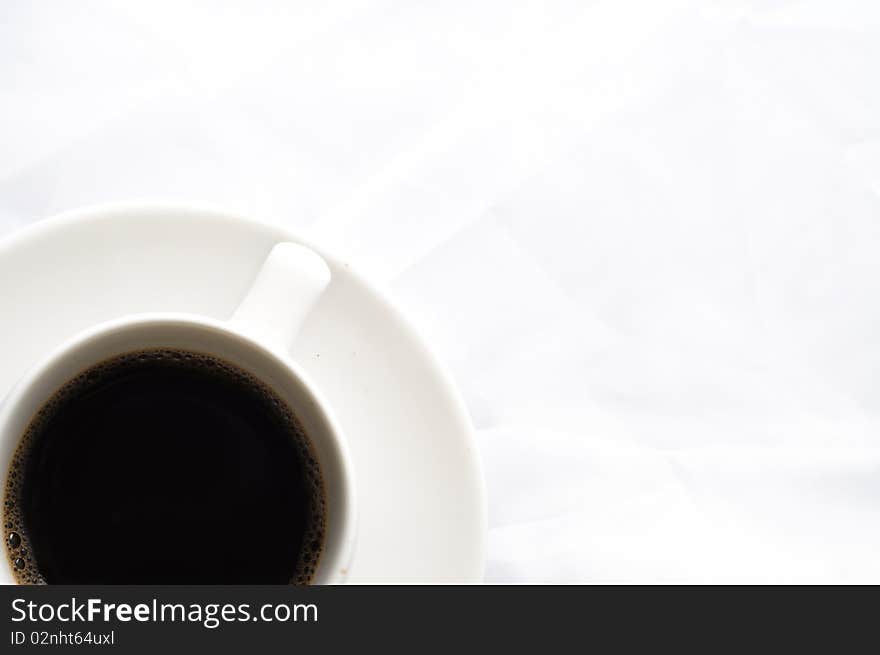 Cup of coffee on white background