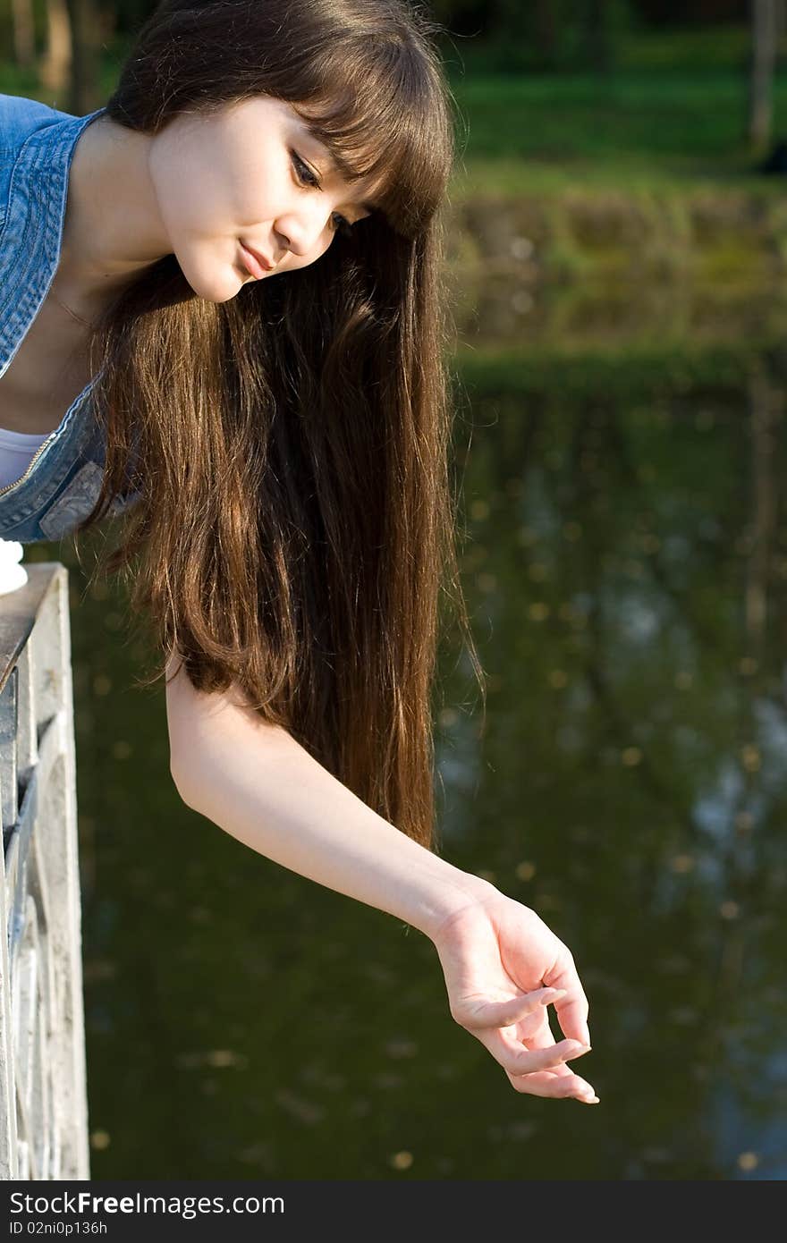 Girl walking in city park. Girl walking in city park