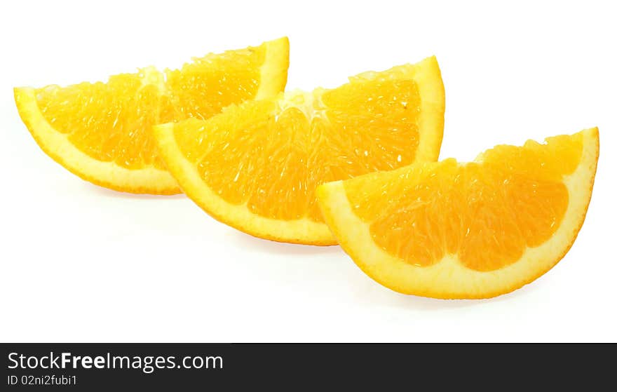 Fresh juicy chopped orange isolated on white background