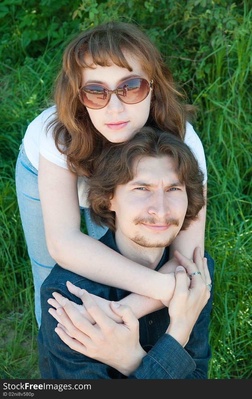 The loving couple has a rest on the nature. Picnic. The loving couple has a rest on the nature. Picnic.