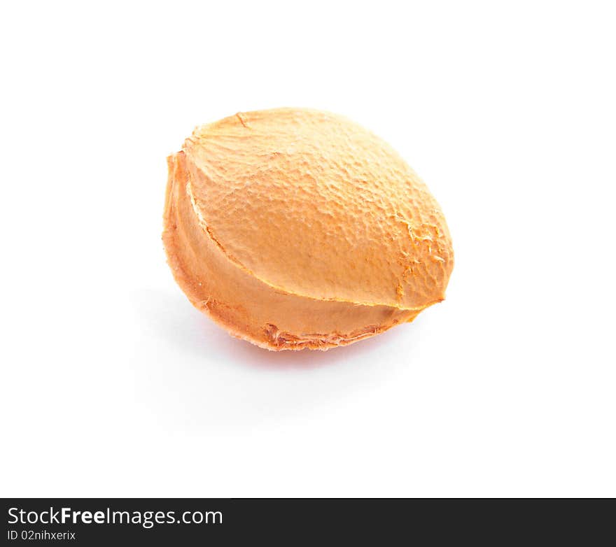 Colorful apricot pip isolated on white background. Colorful apricot pip isolated on white background.