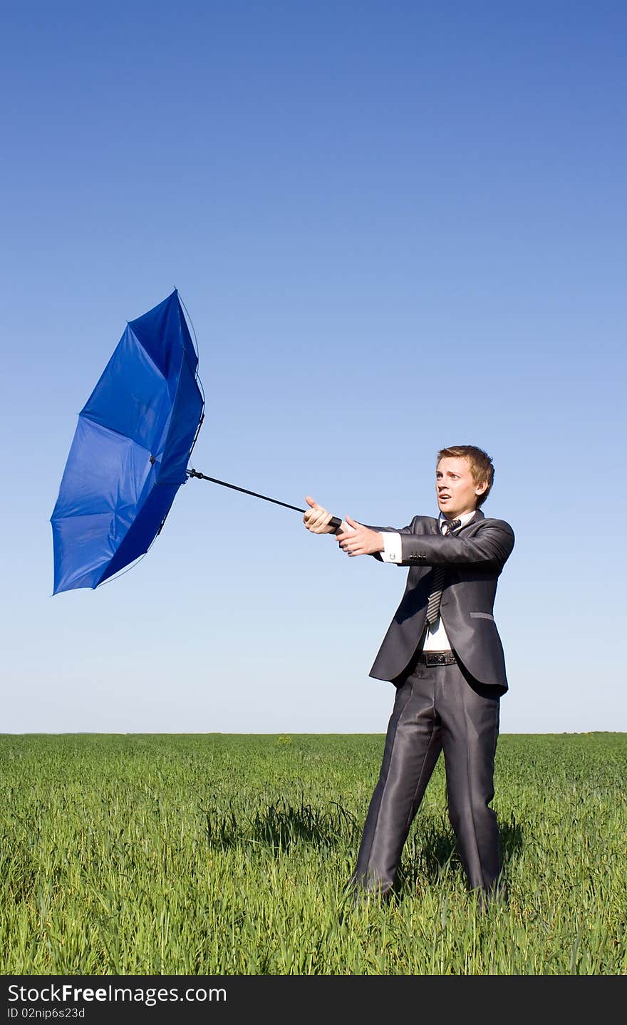 Businessman Finding Protection Outside