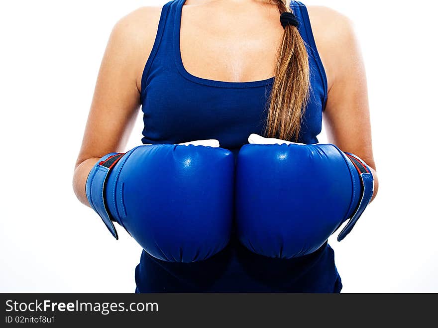 Girl showing blue boxing gloves. Girl showing blue boxing gloves