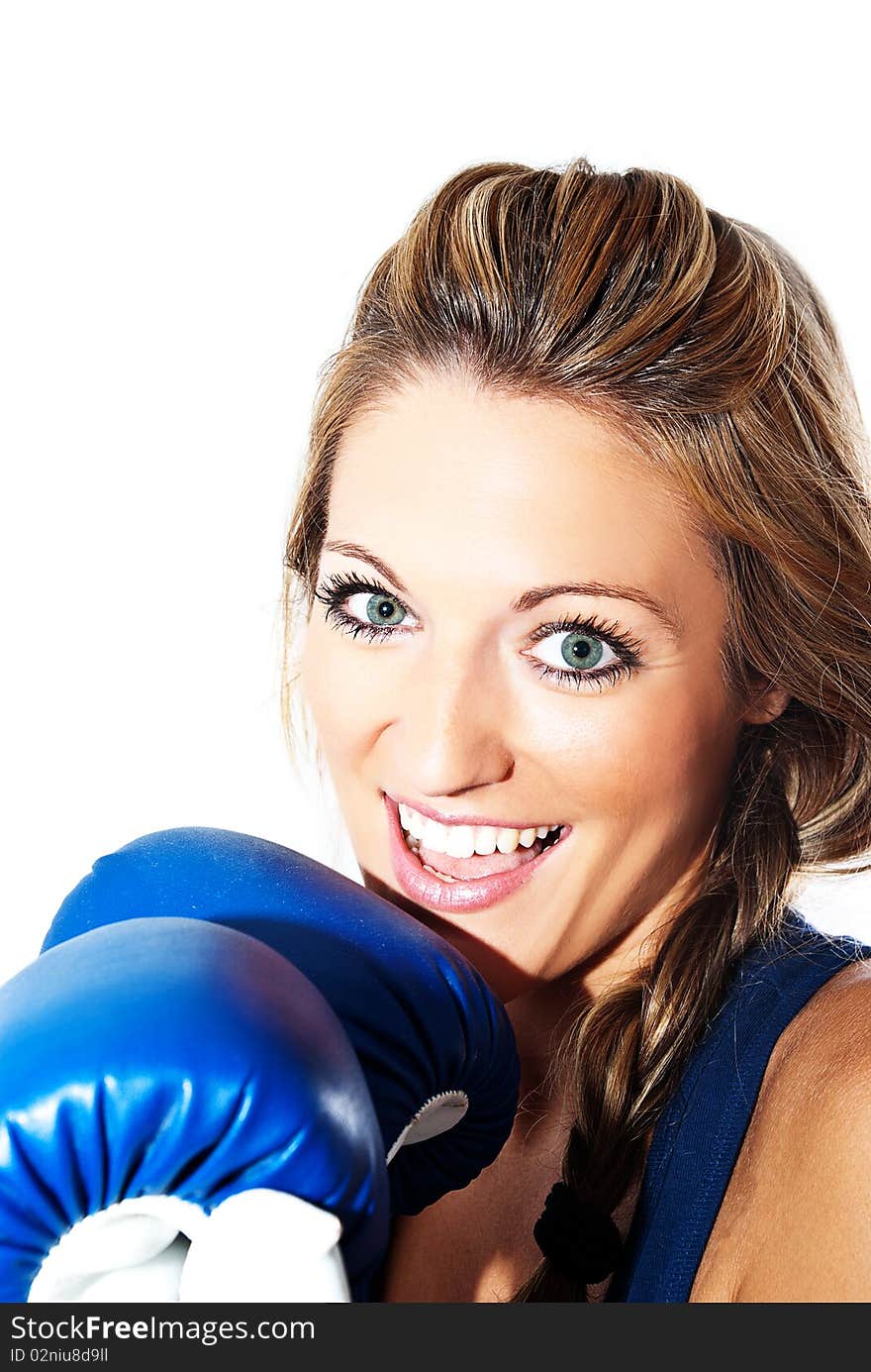 Model with a smile on his face with blue boxing gloves. Model with a smile on his face with blue boxing gloves