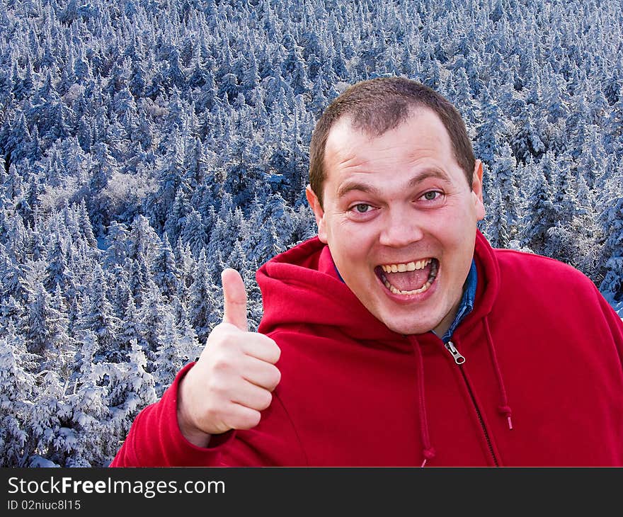 Guy against snow capped mountains. Guy against snow capped mountains.