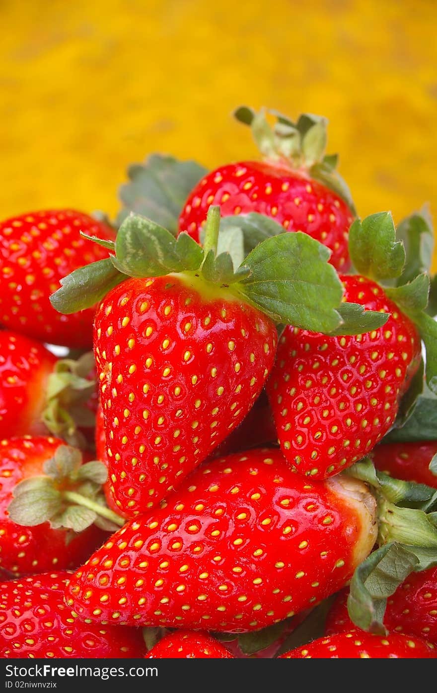 Pile of bright red ripe clean strawberries