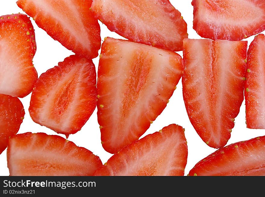 Pile of bright red ripe clean cut strawberries