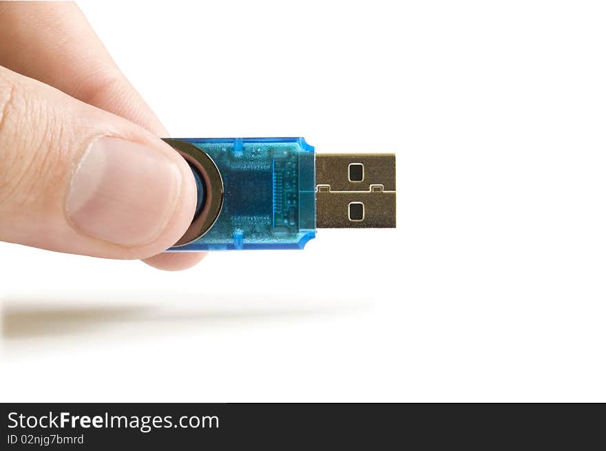 Usb flash in the hand isolated on white