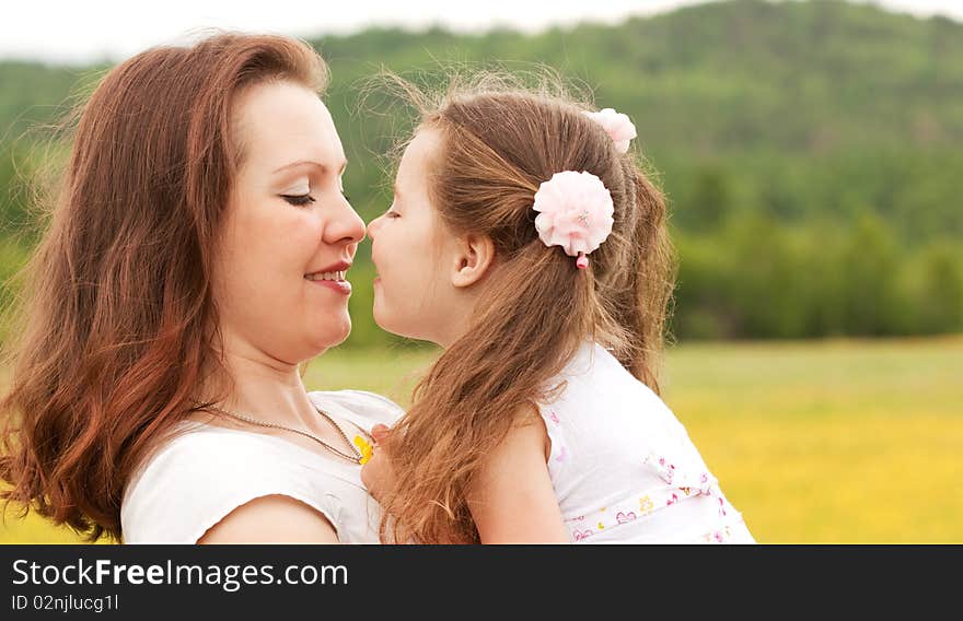 Mum with a daughter on the nature. Mum with a daughter on the nature