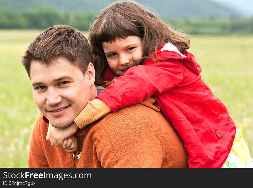 The father with the daughter on the nature. The father with the daughter on the nature