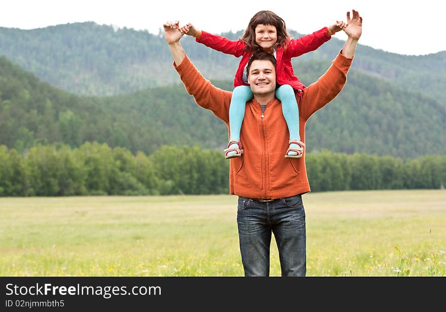 The father with the daughter on the nature. The father with the daughter on the nature