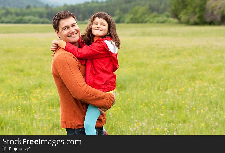 The father with the daughter on the nature. The father with the daughter on the nature