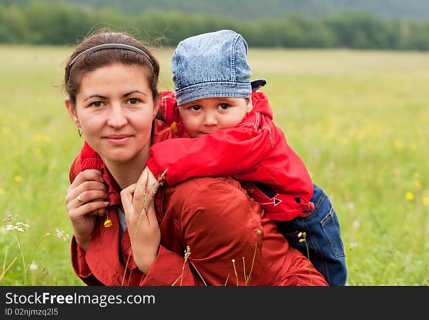 Mum with the son on the nature. Mum with the son on the nature