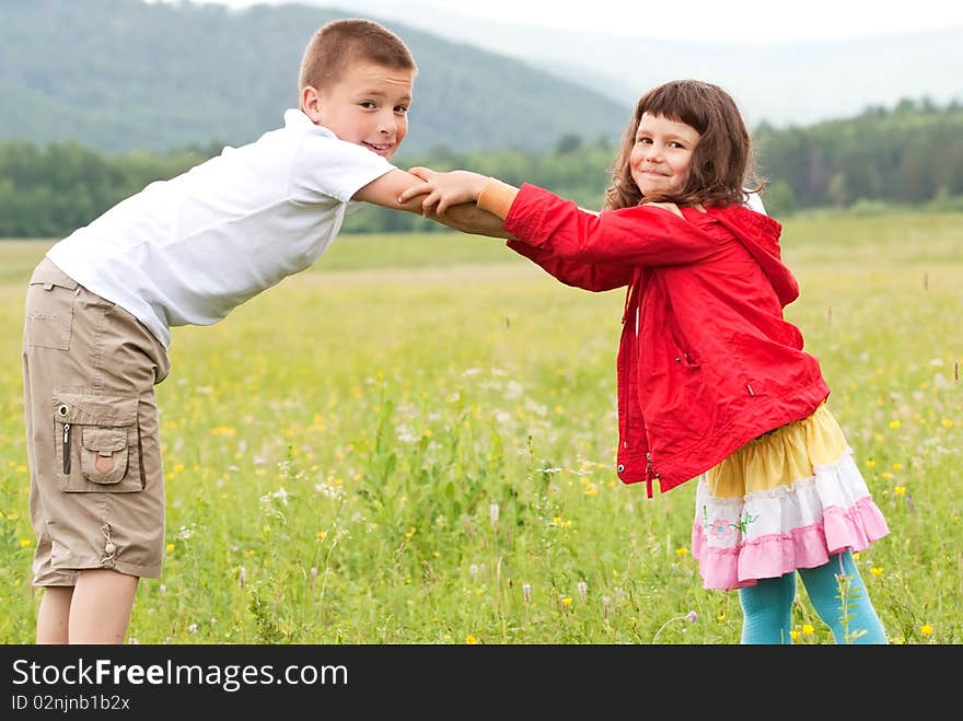 The brother with sister on the nature. The brother with sister on the nature