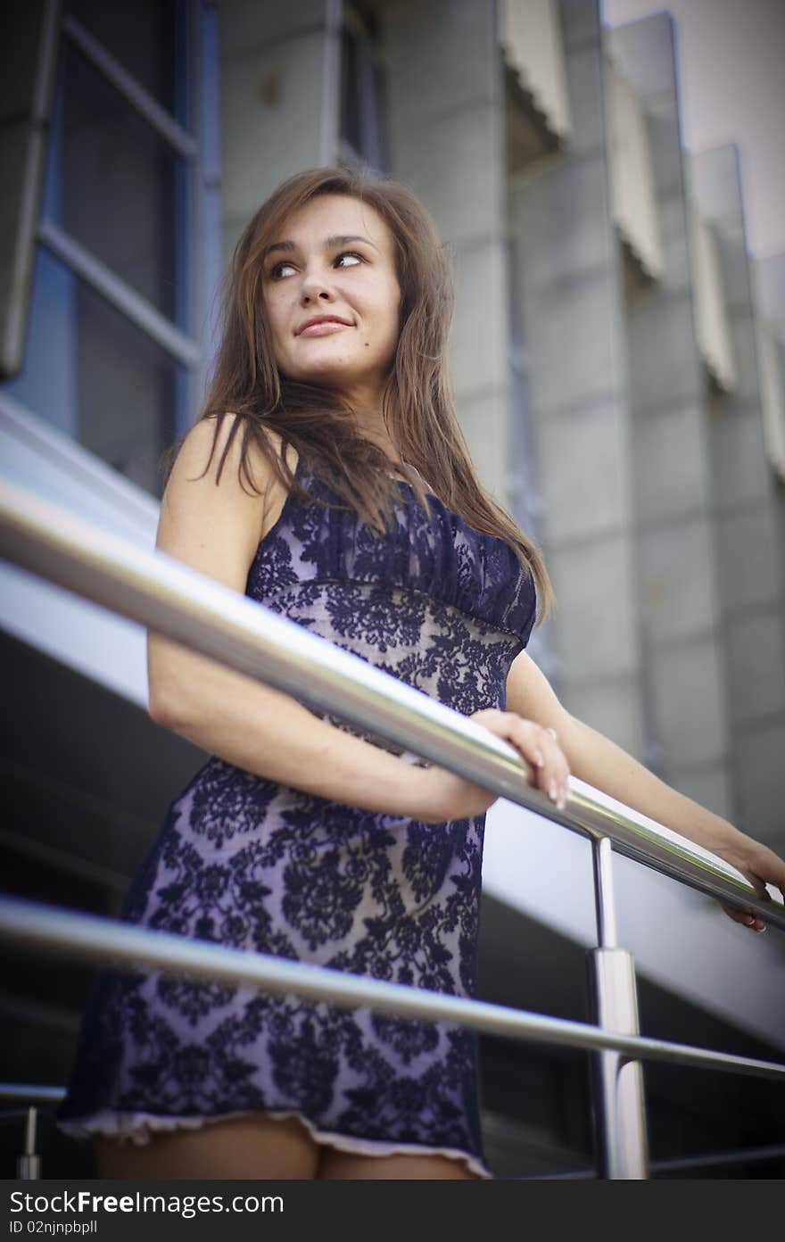 Girl near stair railing