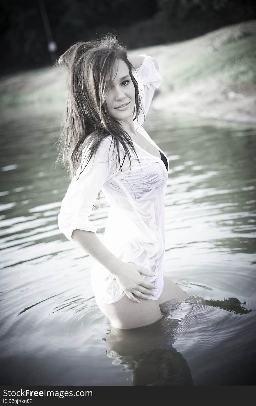 Glamour lady in swimsuit near the beach