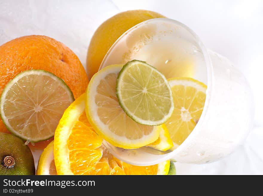 Tropical fruits in glass with ice. Tropical fruits in glass with ice