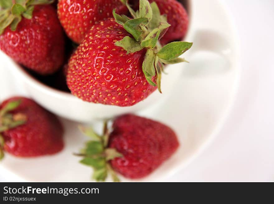 Fresh strawberries in  white cup. Fresh strawberries in  white cup