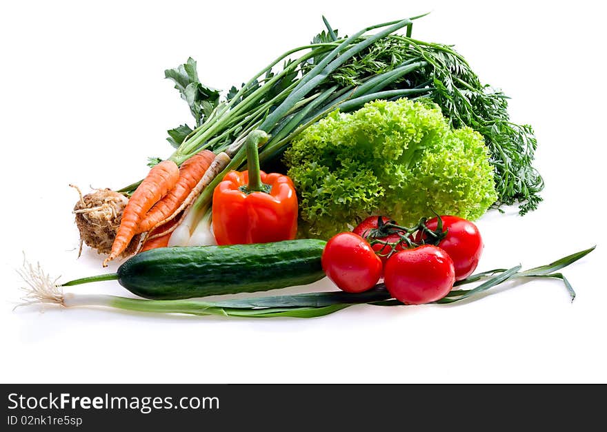 Raw juicy vegetables on white background