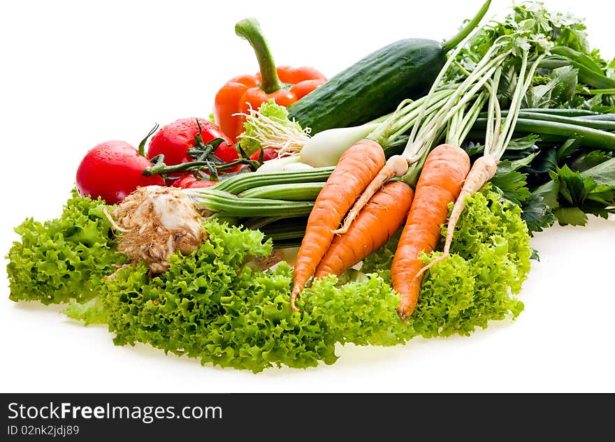 Raw juicy vegetables on white background