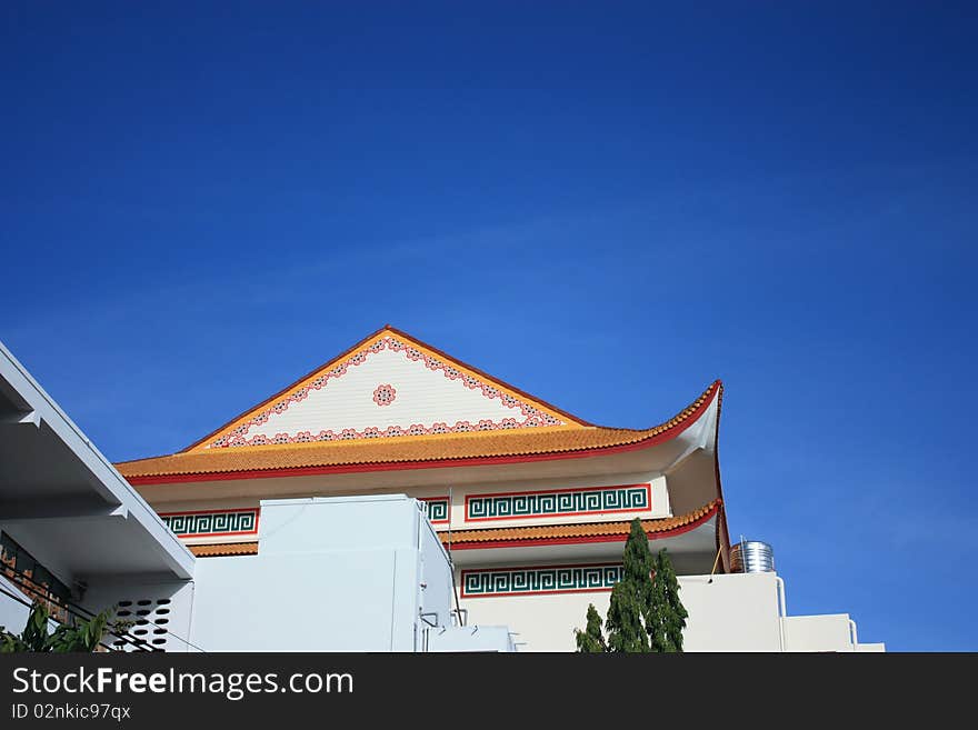 The roof with Chinese style with blue sky.