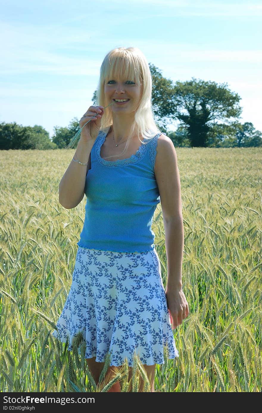 Blond Woman In Field