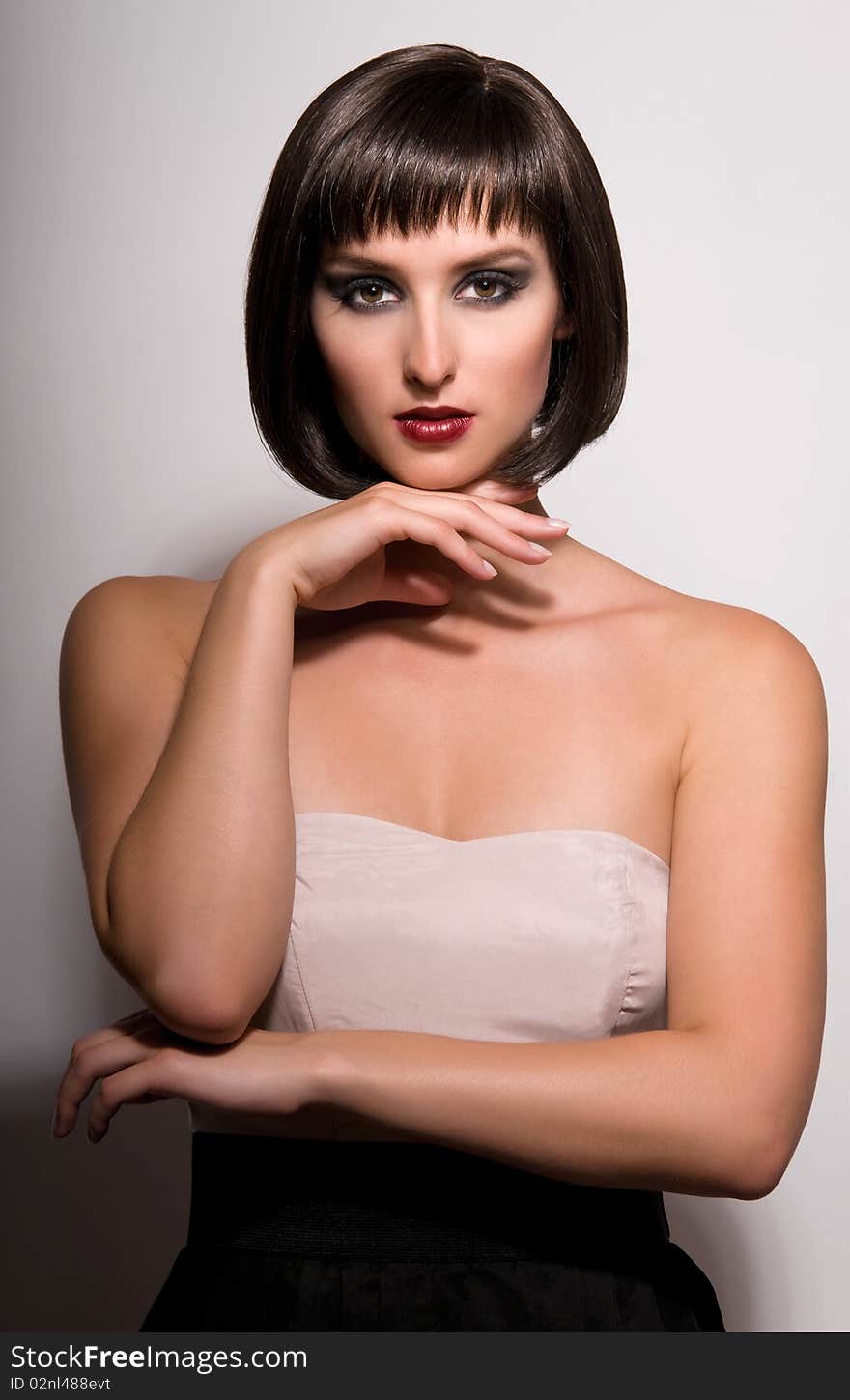 Portrait of young beautiful woman on white. Portrait of young beautiful woman on white.