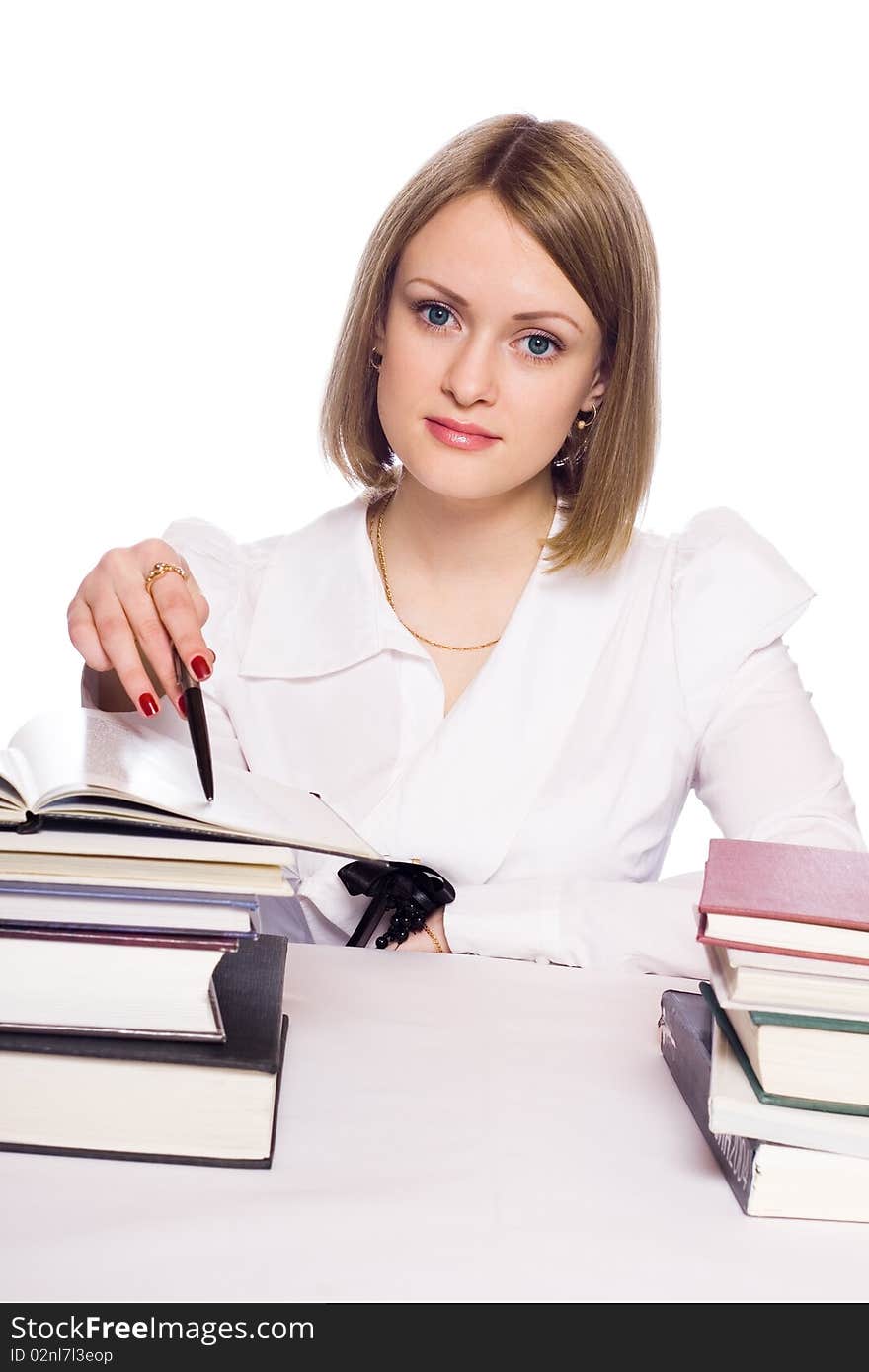 Young woman reading book on a white background