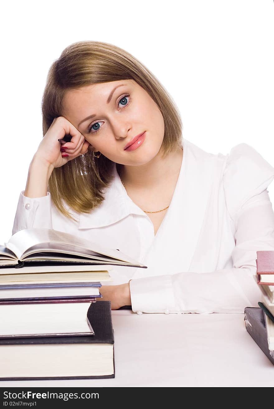 Young woman reading book on a white background