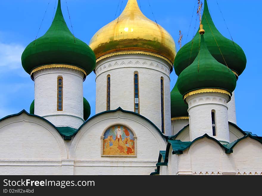 Domes of russian Christian chrurch: four green and one golden. Domes of russian Christian chrurch: four green and one golden.