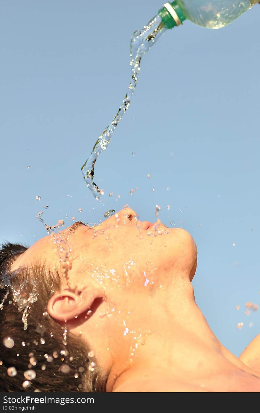 A Young Man Pours Water