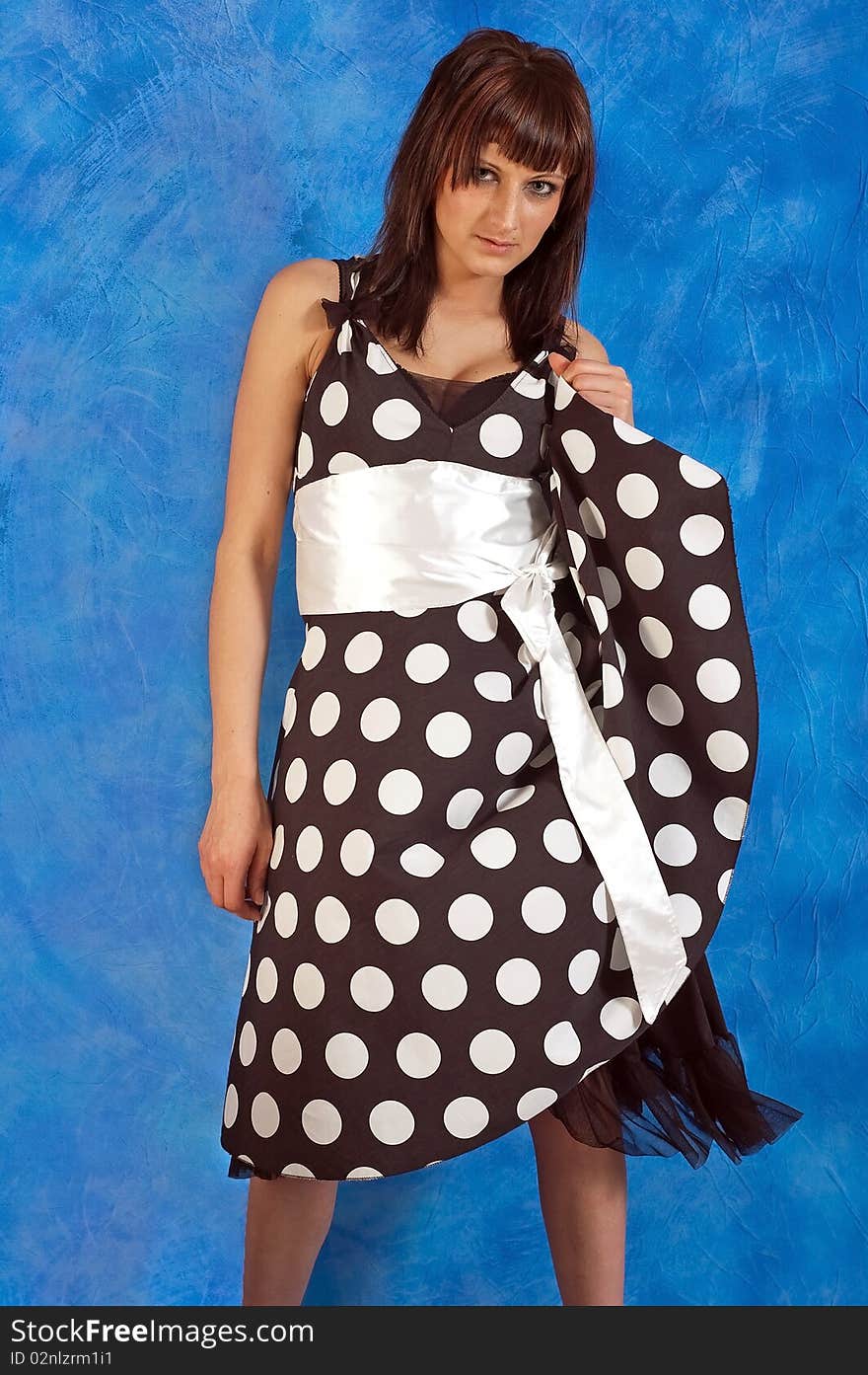 Girl in polka-dot dress