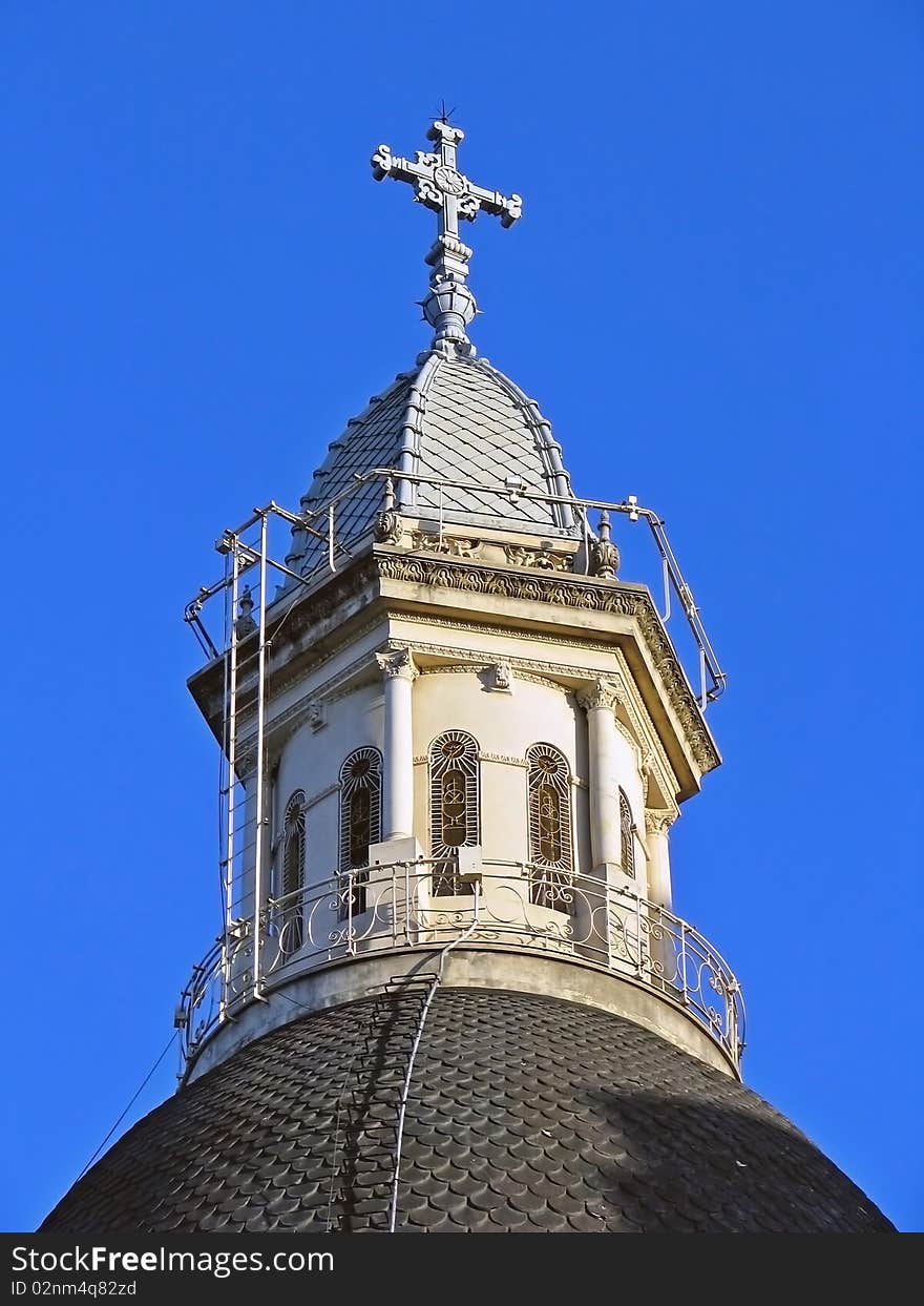 Old church dome against a blue sky.
