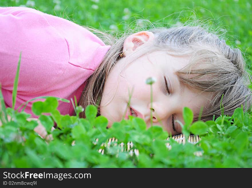 Girl Sleeping In The Grass