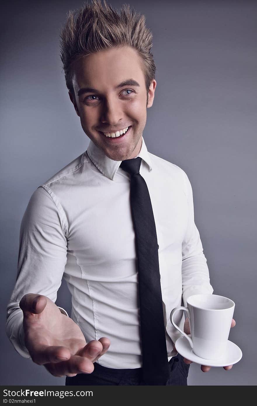 Young Attractive Macho Drinking Coffe