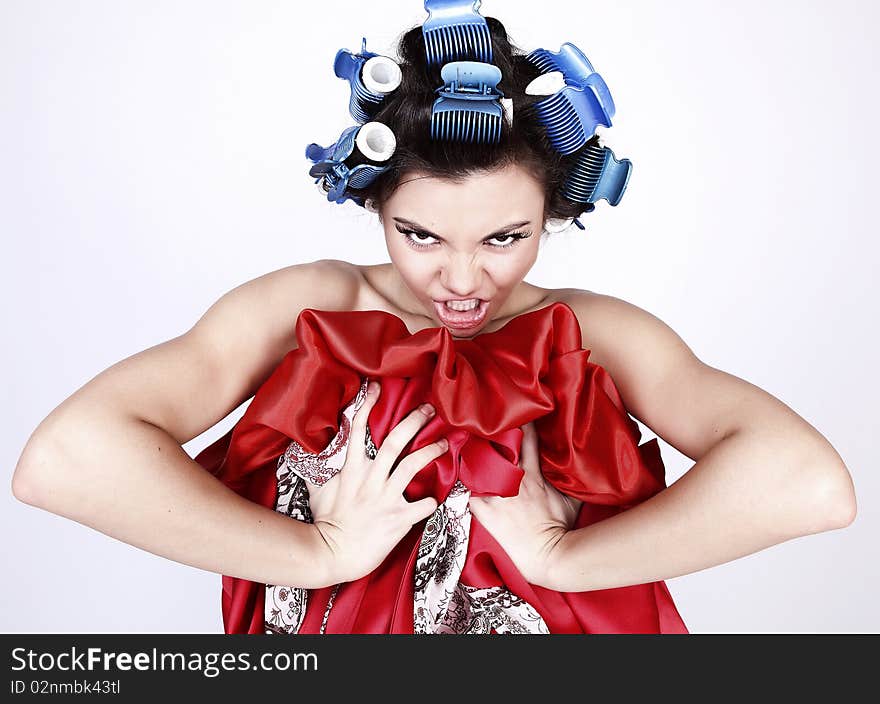 Emotional Girl with hair-curlers on her head