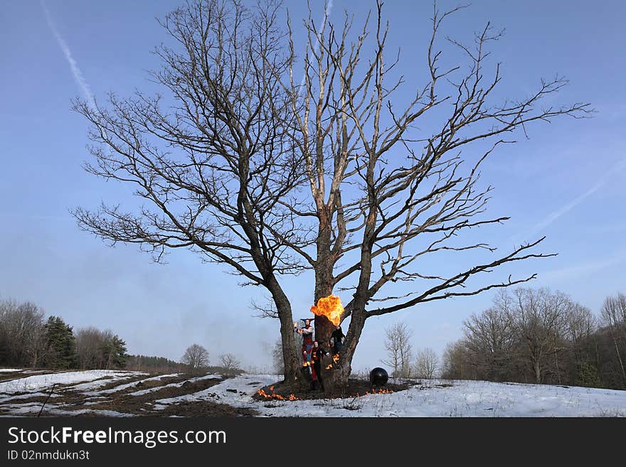 Ancient Art collective showing elements of fiery show. Outdoor photo.