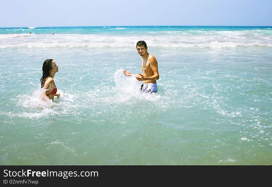 Couple in the sea on vacation.