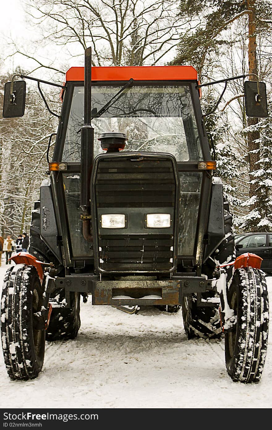 The red tracktor in wintertime. The red tracktor in wintertime