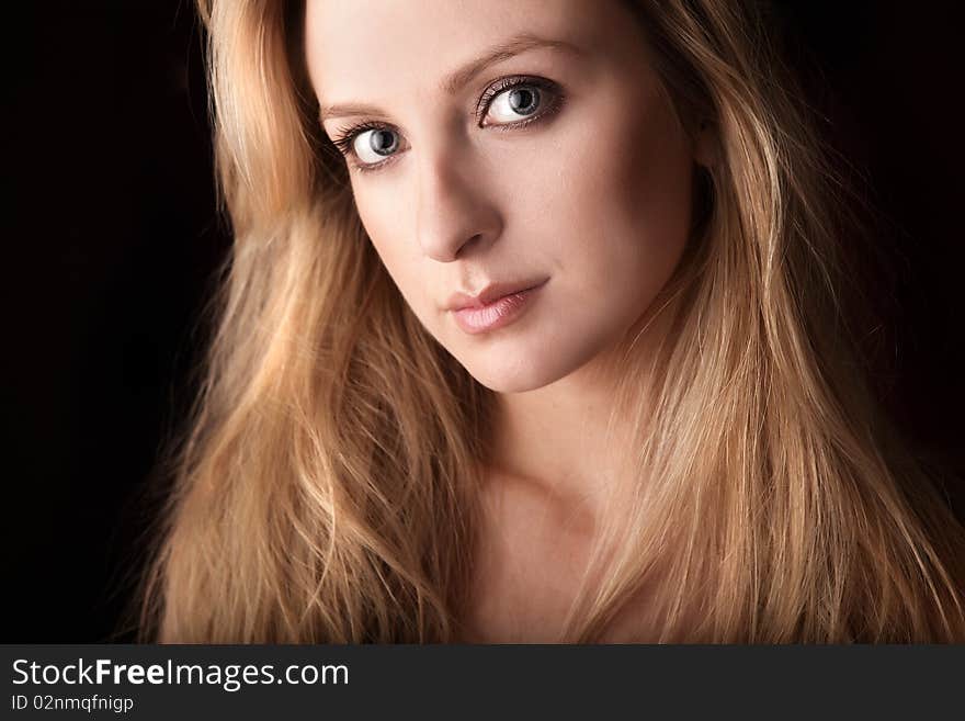 Portrait Of Attractive Young Blond Woman.