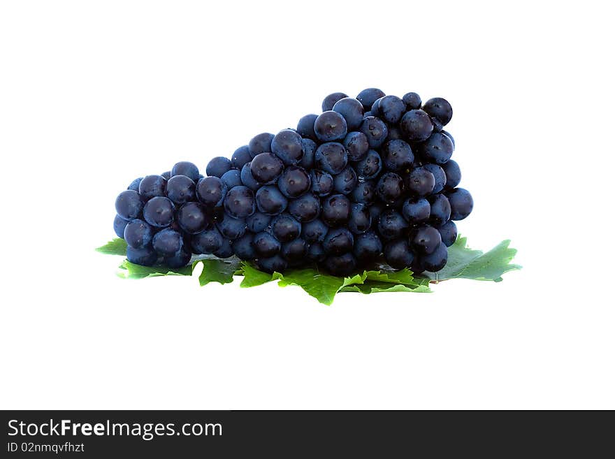 Grapes with leaves isolated on white background