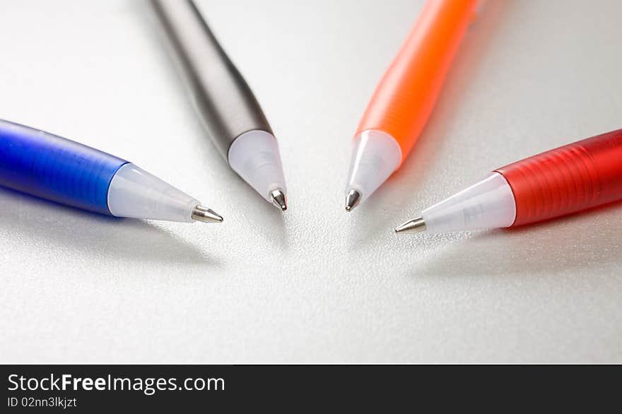 Set of colored pens on table