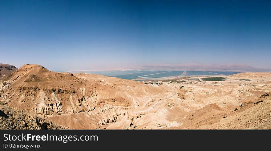 Desert with a kind on the Dead Sea