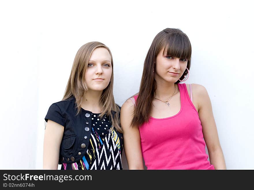 Two female friends posing outdoor